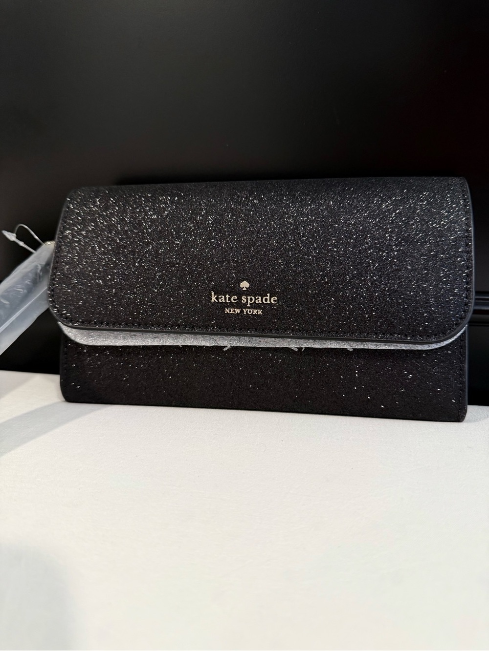 kate spade Black Glitter Foldover Clutch with Gold Logo